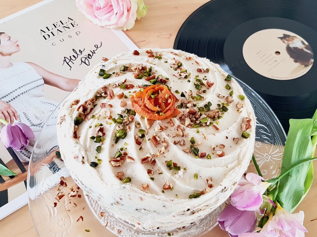 Vegan layer carrot cake with pecan and pistacchio next to Alela Diane Cusp vinyl record