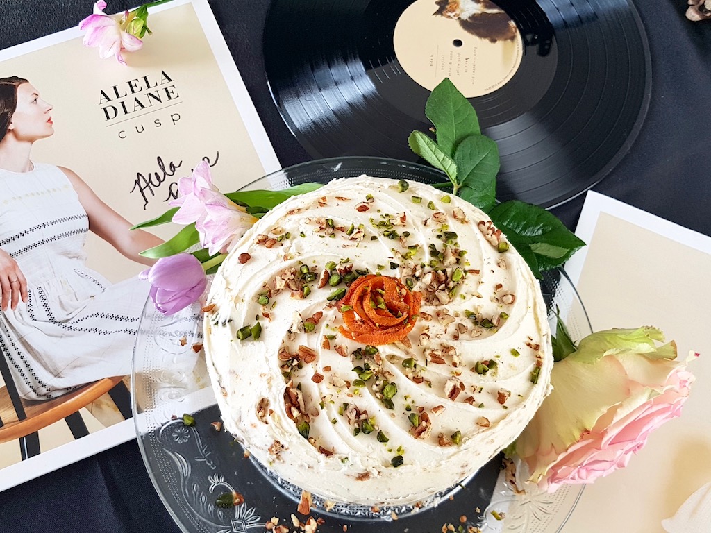 Vegan layer carrot cake with pecan and pistacchio next to Alela Diane Cusp vinyl record
