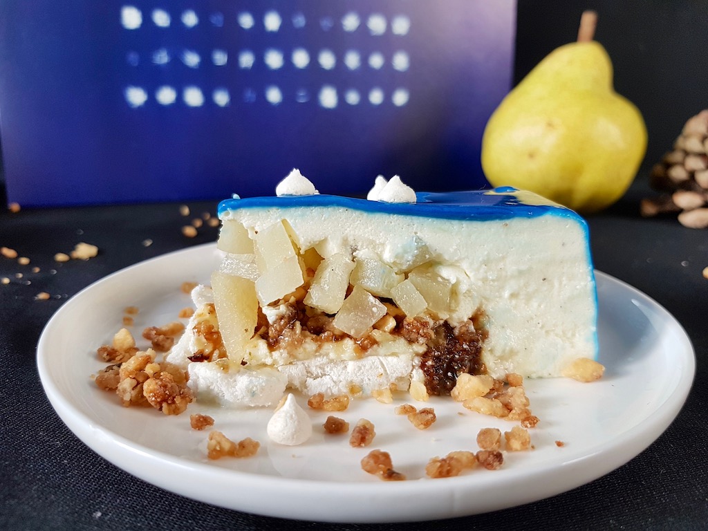 Olafur Arnalds inspired entremet slice clise up with skyr bavarois poached pears caramelized oats and meringue