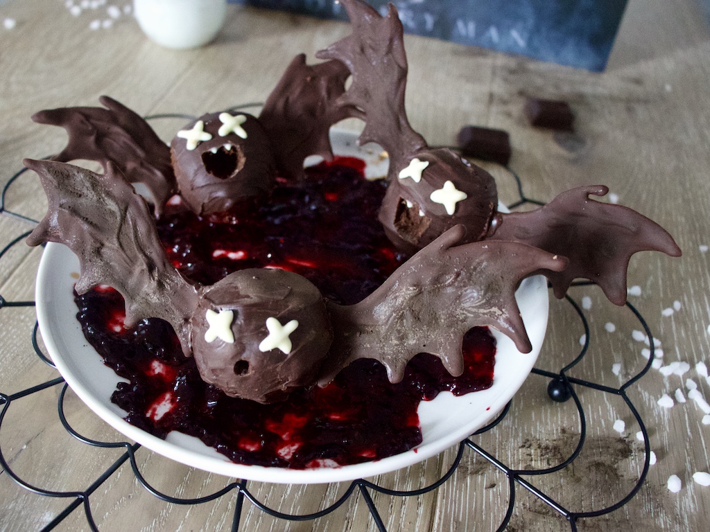 Bat chocolate truffles on a plate