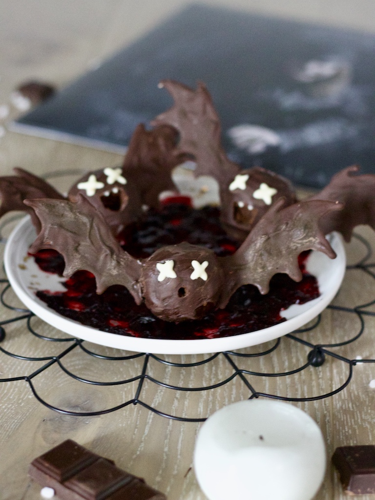 Bat chocolate truffles on a plate