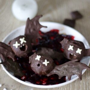 Bat chocolate truffles on a plate