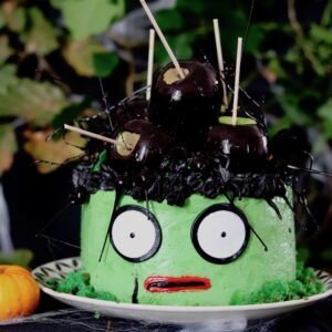 Robert Smith inspired matcha layer cake topped with black apple candy
