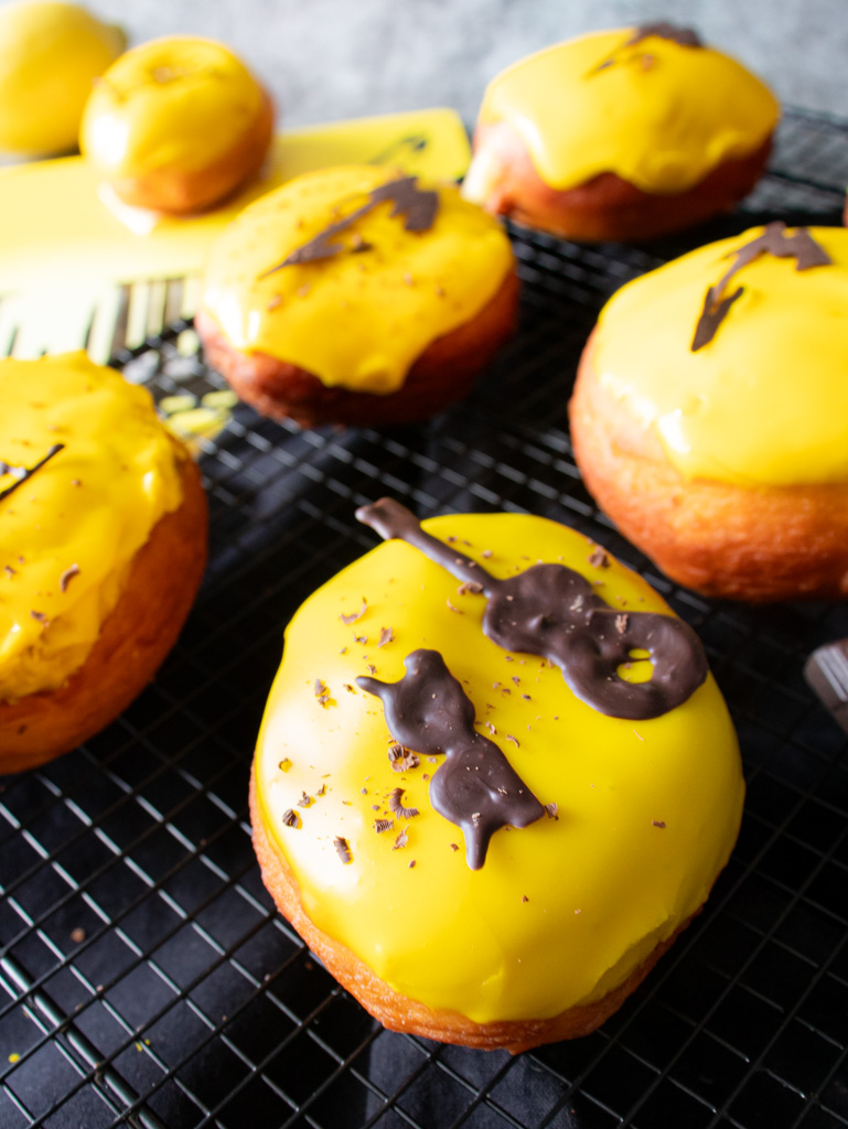 Donuts filled with lemon curd with Metallica album