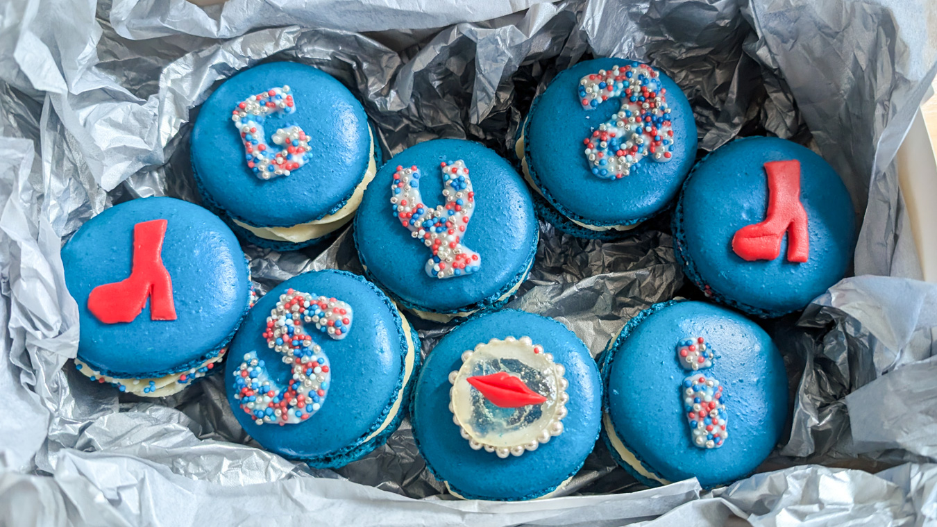 Gyasi inspired blue macarons with blue and red sprinkles red boots and red lips