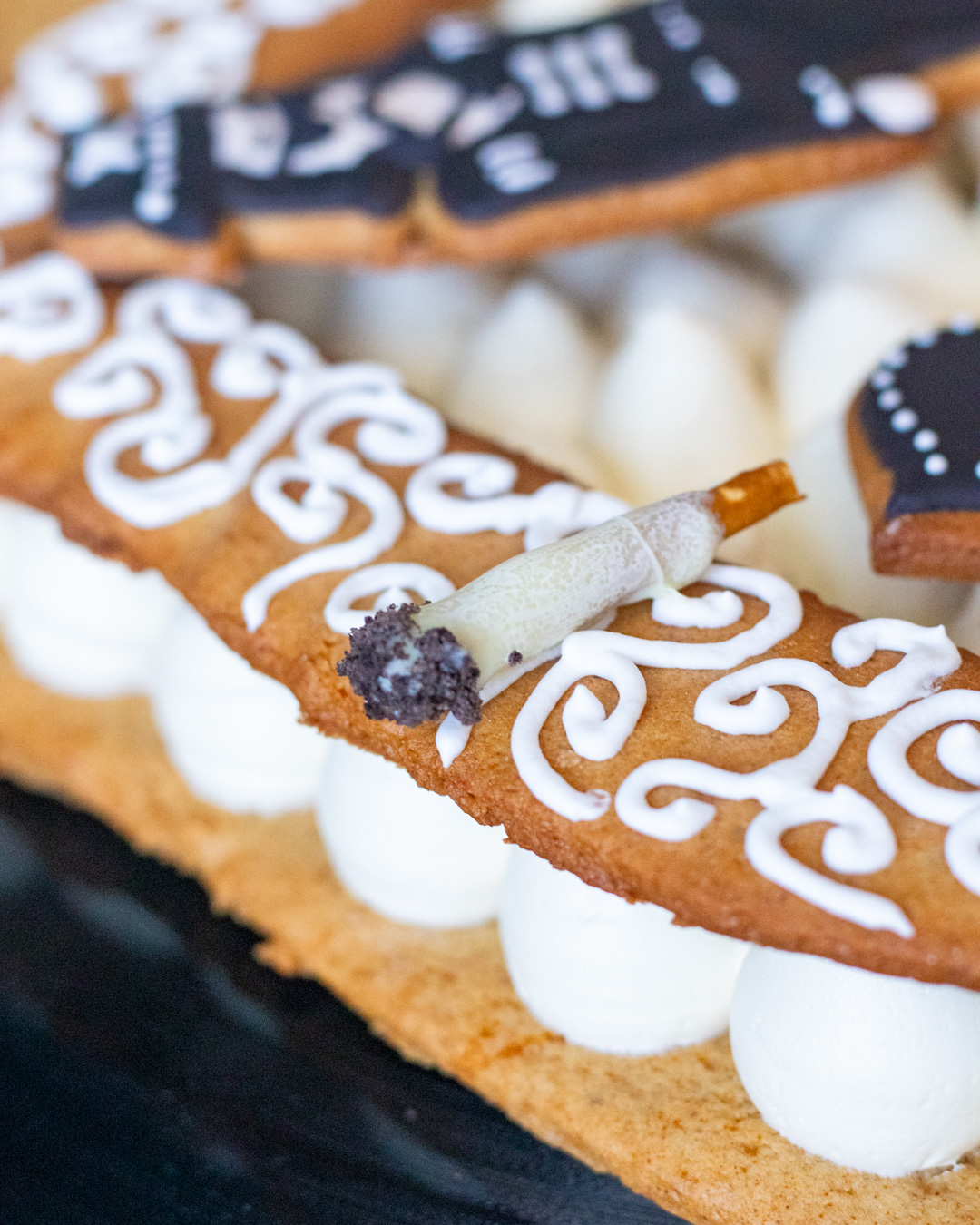 Motorhead inspired cake with bretzel and white chocolate cigarette