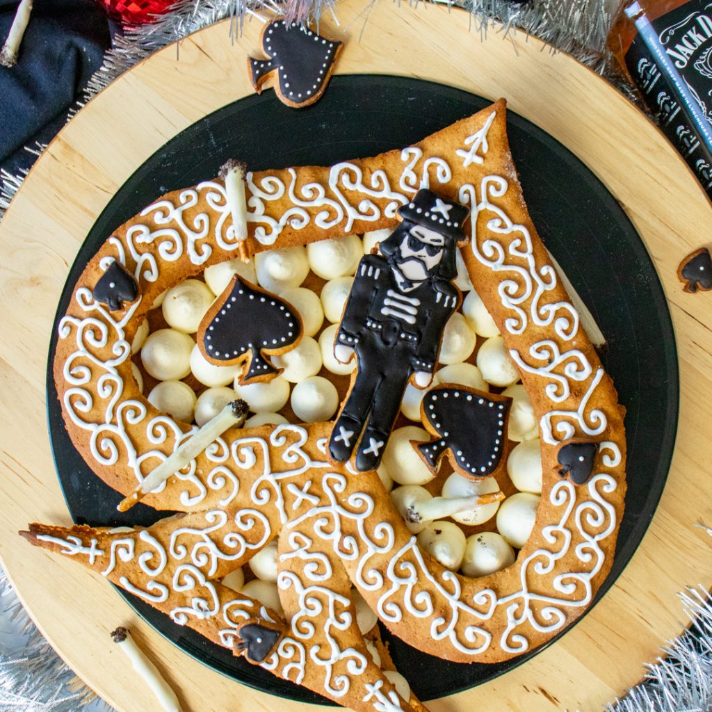 Motorhead inspired cake with gingerbread ace of spades and Lemmy Kilmister