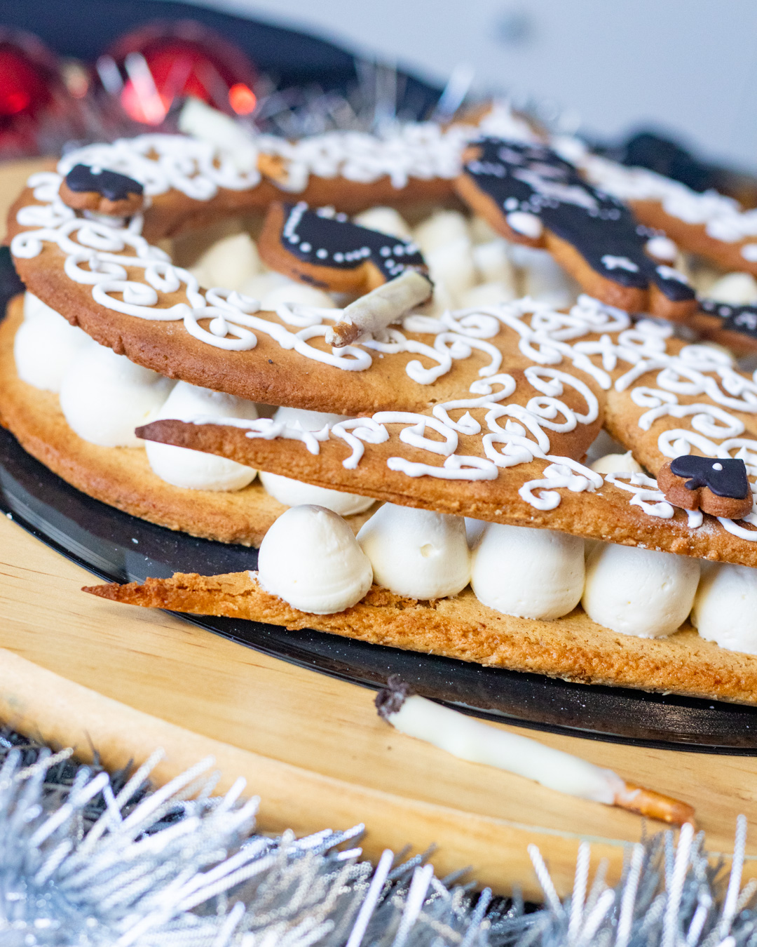 Motorhead inspired cake with gingerbread ace of spades and whiskey buttercream