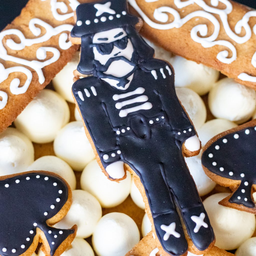 Motorhead inspired cake with gingerbread ace of spades and Lemmy Kilmister