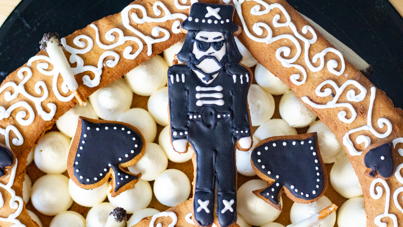 Motörhead inspired cake with Lemmy Kilmister gingerbread cookie