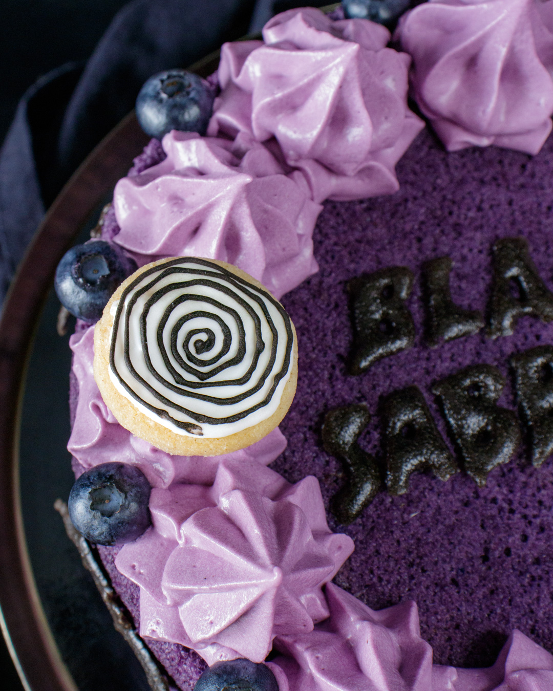 Black Sabbath inspired purple cake swirl detail
