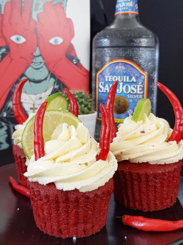 QOTSA inspired Villains red velvet devil cupcakes topped with tequila buttercream