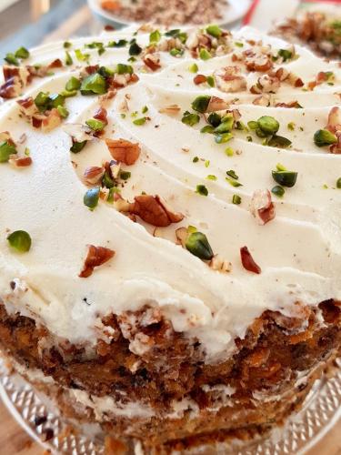 Vegan layer carrot cake with pecan and pistacchio detail