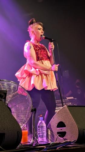 Kathleen Hanna on stage with Bikini Kill in Bordeaux 2024