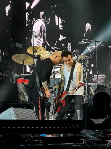 The Cure Simon Gallup and red guitar