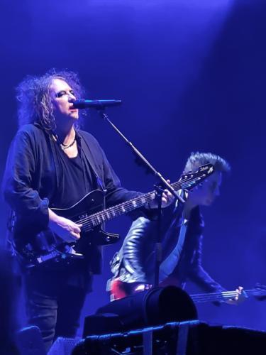 Robert Smith and Simon Gallup on stage