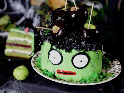 Robert Smith inspired matcha layer cake topped with black apple candy