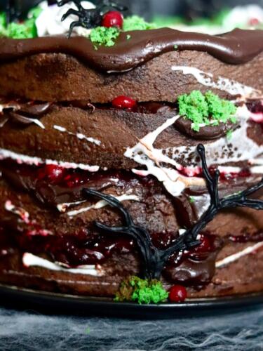 Chocolate layer cake filled with red berries