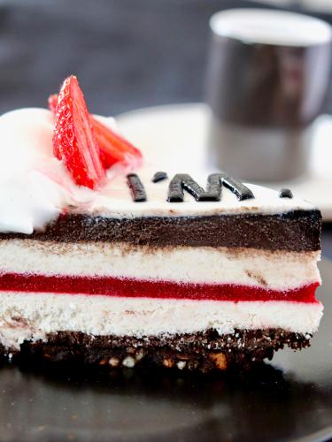 Graphic cheesecake slice close up