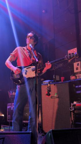 Ryan Needham on stage with Yard Act