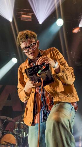 James Smith lead singer from Yard Act on stage 2024